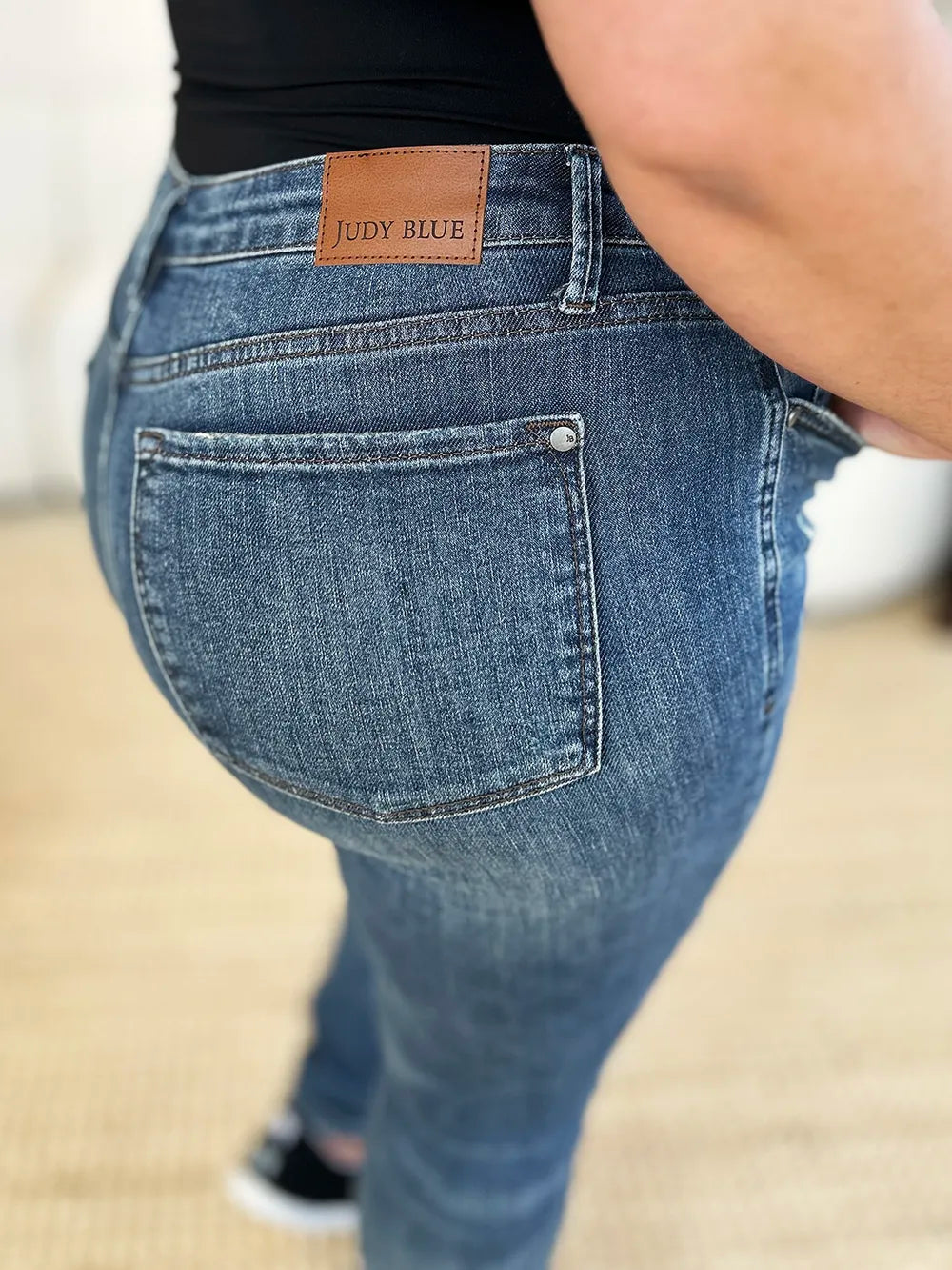Judy Blue Full Size Mid Waist Distressed Slim Jeans | CentPrime Denim