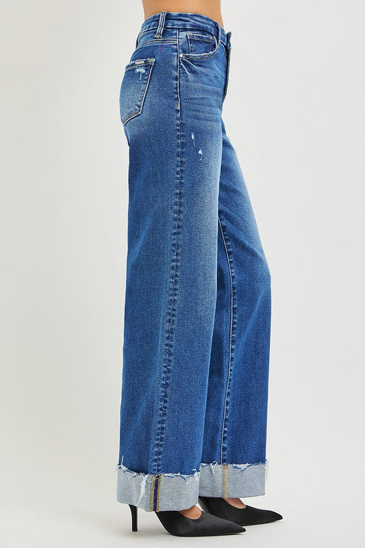 Side profile of Centprime RISEN wide leg jeans showing high rise waist, slightly stretchy denim, and polished cuffed hem in vintage indigo