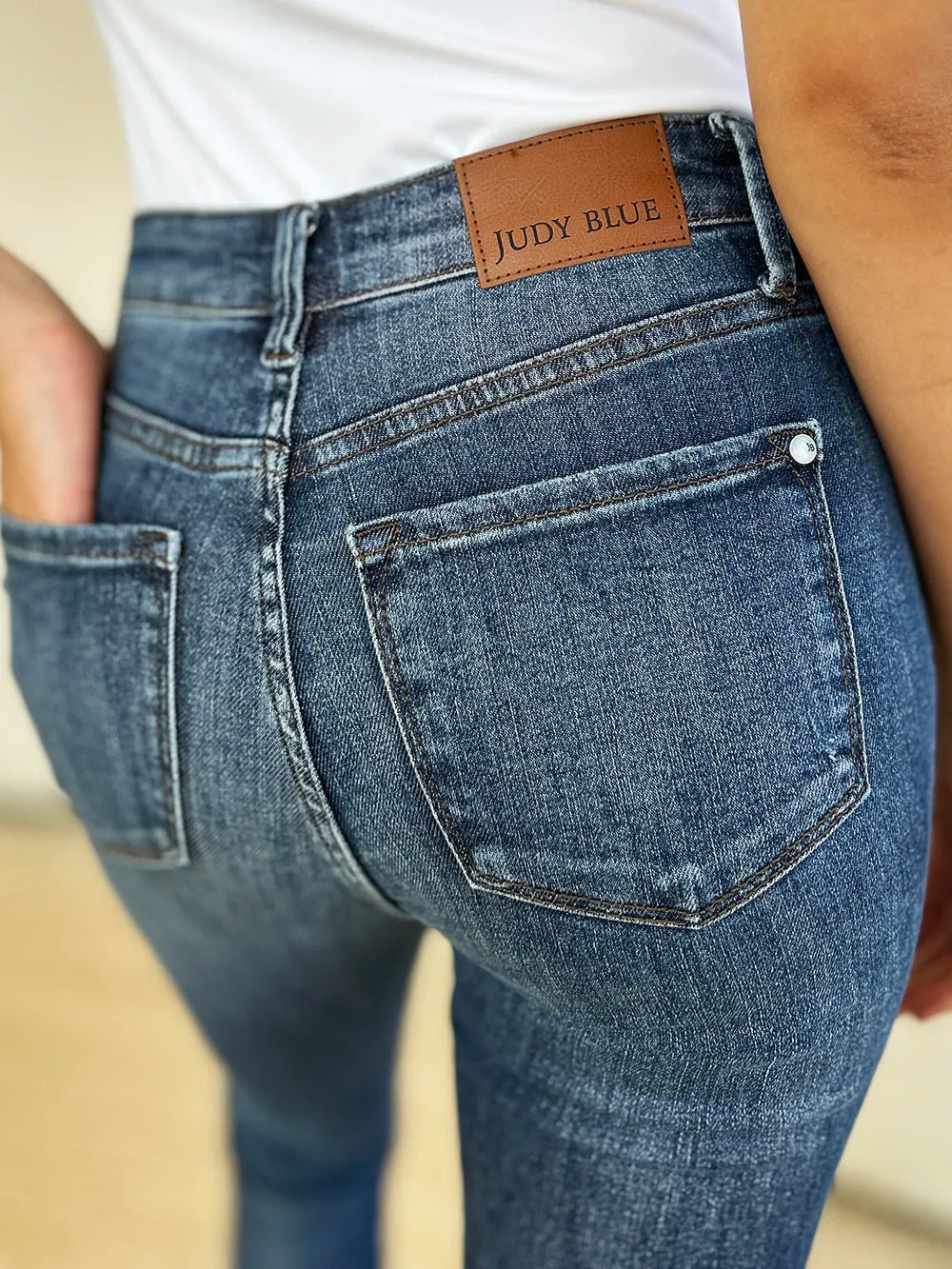 Judy Blue Full Size Mid Waist Distressed Slim Jeans | CentPrime Denim