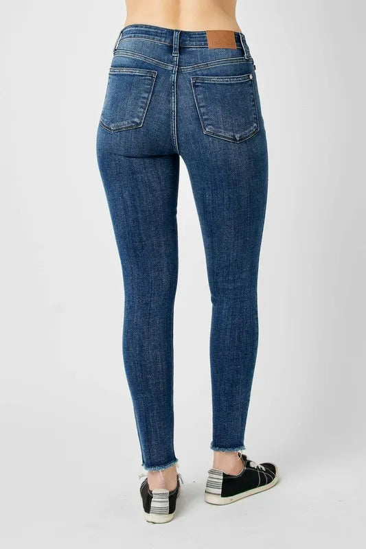 Back view of Judy Blue full size high waist distressed skinny jeans showing pockets and high rise.