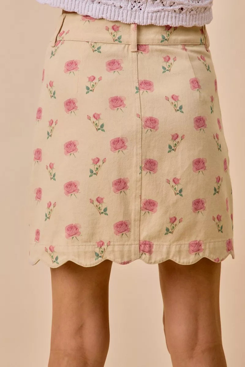 SO ME Floral Rose Print Scallop Hem Mini Skirt back view - rear view of floral print mini skirt with center back seam or zip, scalloped hem continuing around, and relaxed summer silhouette