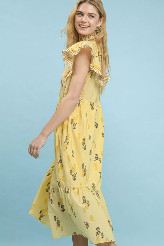 Side view of Umgee floral ruffle sleeve tiered midi dress highlighting tiered skirt