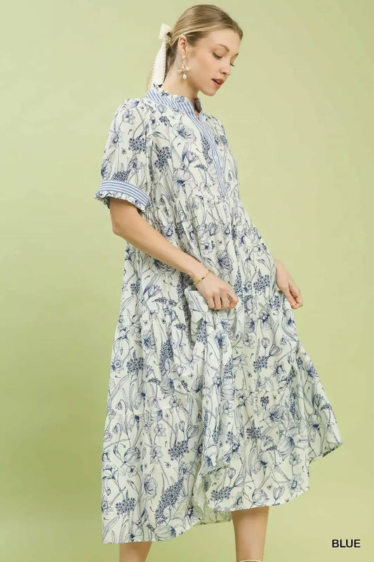 Side view of Umgee tiered midi dress highlighting layered ruffle trim and flattering flowy silhouette for women