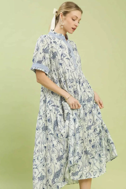 Side view of Umgee tiered midi dress highlighting layered ruffle trim and flattering flowy silhouette for women