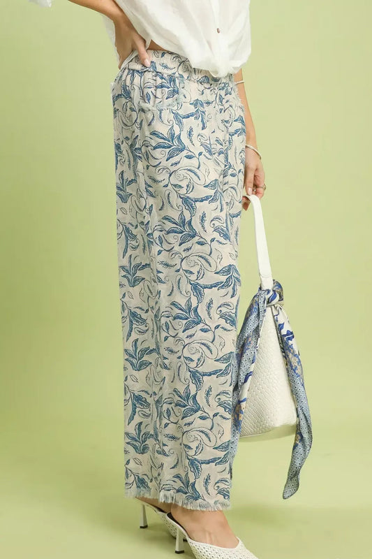 Side view of Umgee Linen Printed Wide Leg Raw Hem Pants showing flowing wide leg, relaxed fit, and breezy linen fabric.