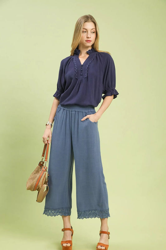 Front angle of Umgee linen wide leg cropped pants showing lace trim detail