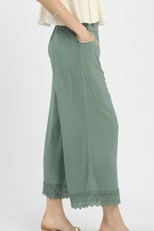 Side view of Umgee Wide Leg Cropped Pants highlighting breezy fit and delicate lace trim, perfect for US summer fashion trends