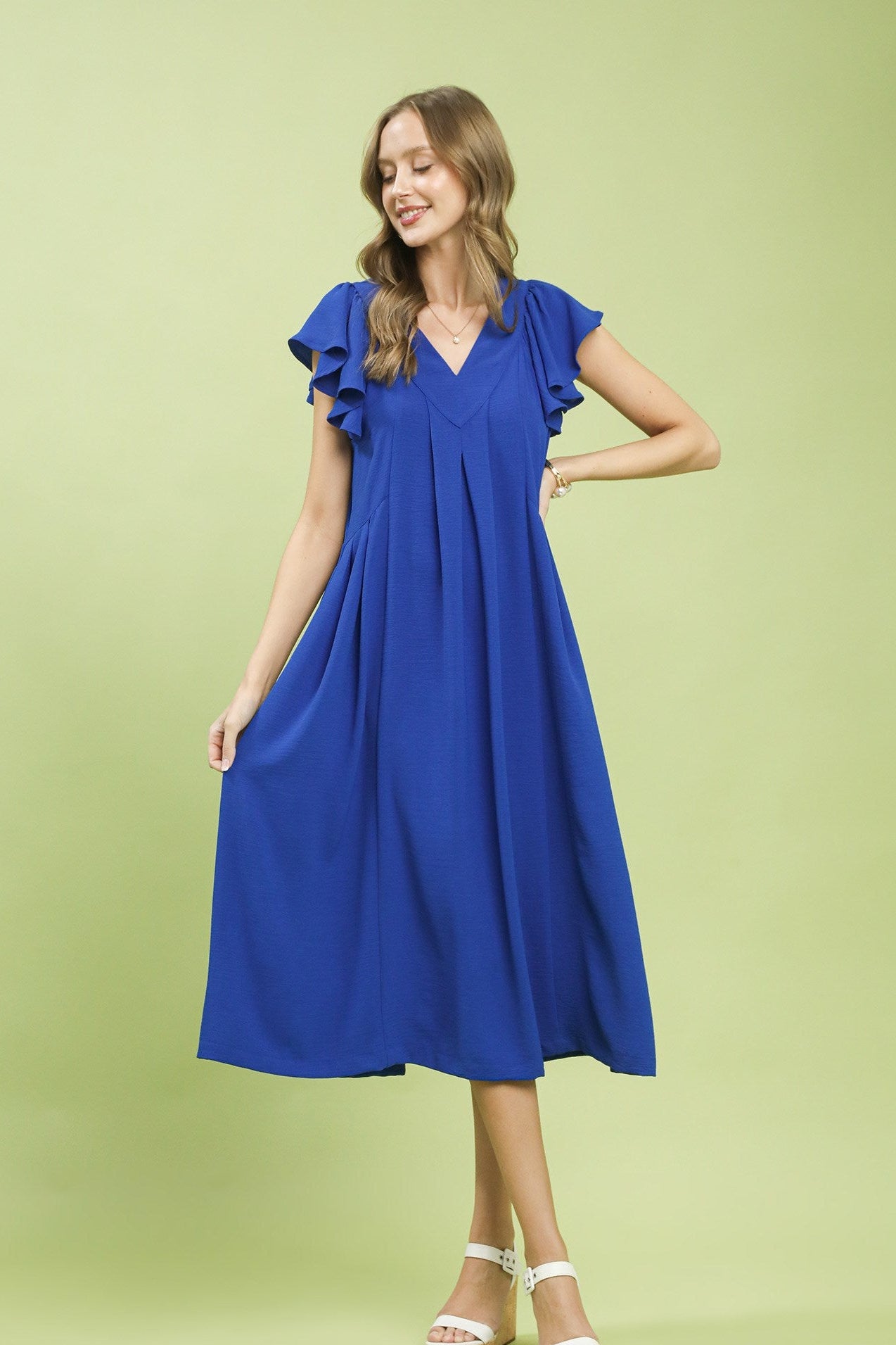 Close-up front view of Umgee Ruffle Sleeve V-Neck Midi Dress highlighting soft fabric and elegant V-neckline.