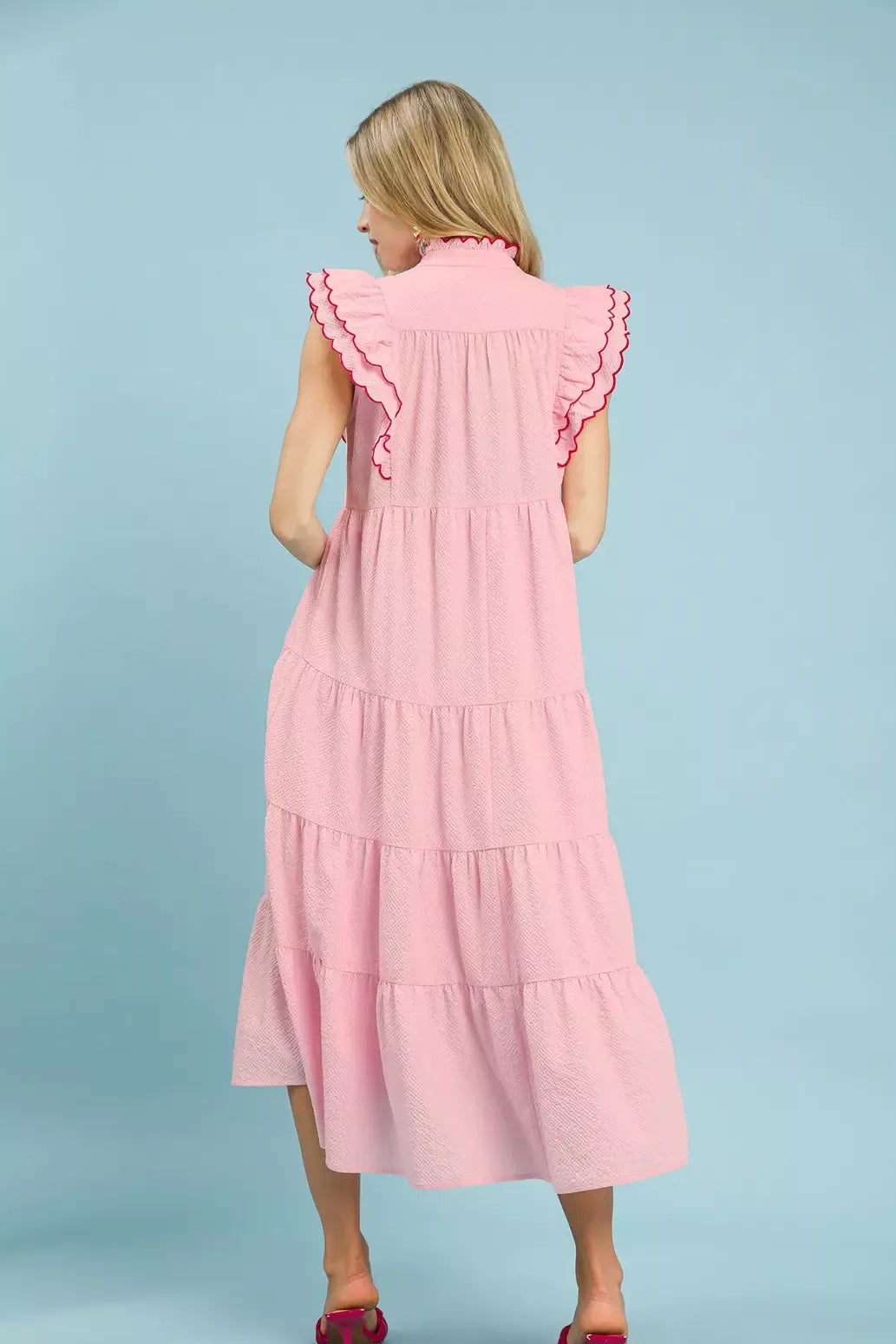 Umgee seersucker ruffle sleeve tiered midi dress back view, model facing away, boho summer dress, ruffle sleeves visible from back, tiered midi length, seersucker texture