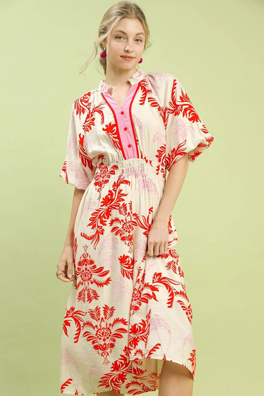 Front detail of Umgee tropical print midi dress highlighting buttons and lightweight fabric
