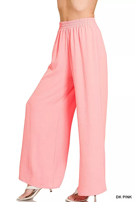 Side view of Zenana woven airflow elastic waistband pants showing drape and flow