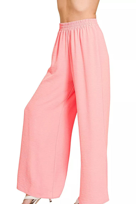Side view of Zenana woven airflow elastic waistband pants showing drape and flow