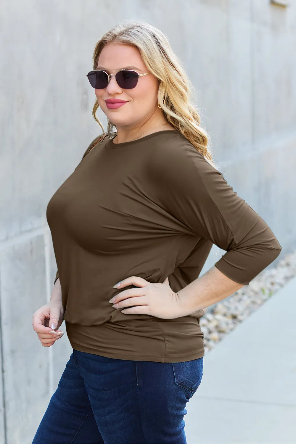 Side angle of Basic Bae round neck batwing sleeve top showing comfortable, relaxed silhouette
