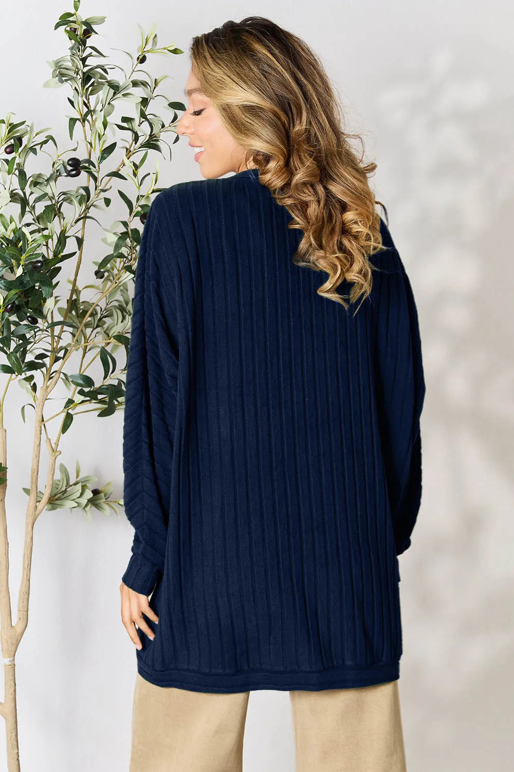 Basic Bae ribbed cocoon cardigan back profile emphasizing soft knit fabric and relaxed shape
