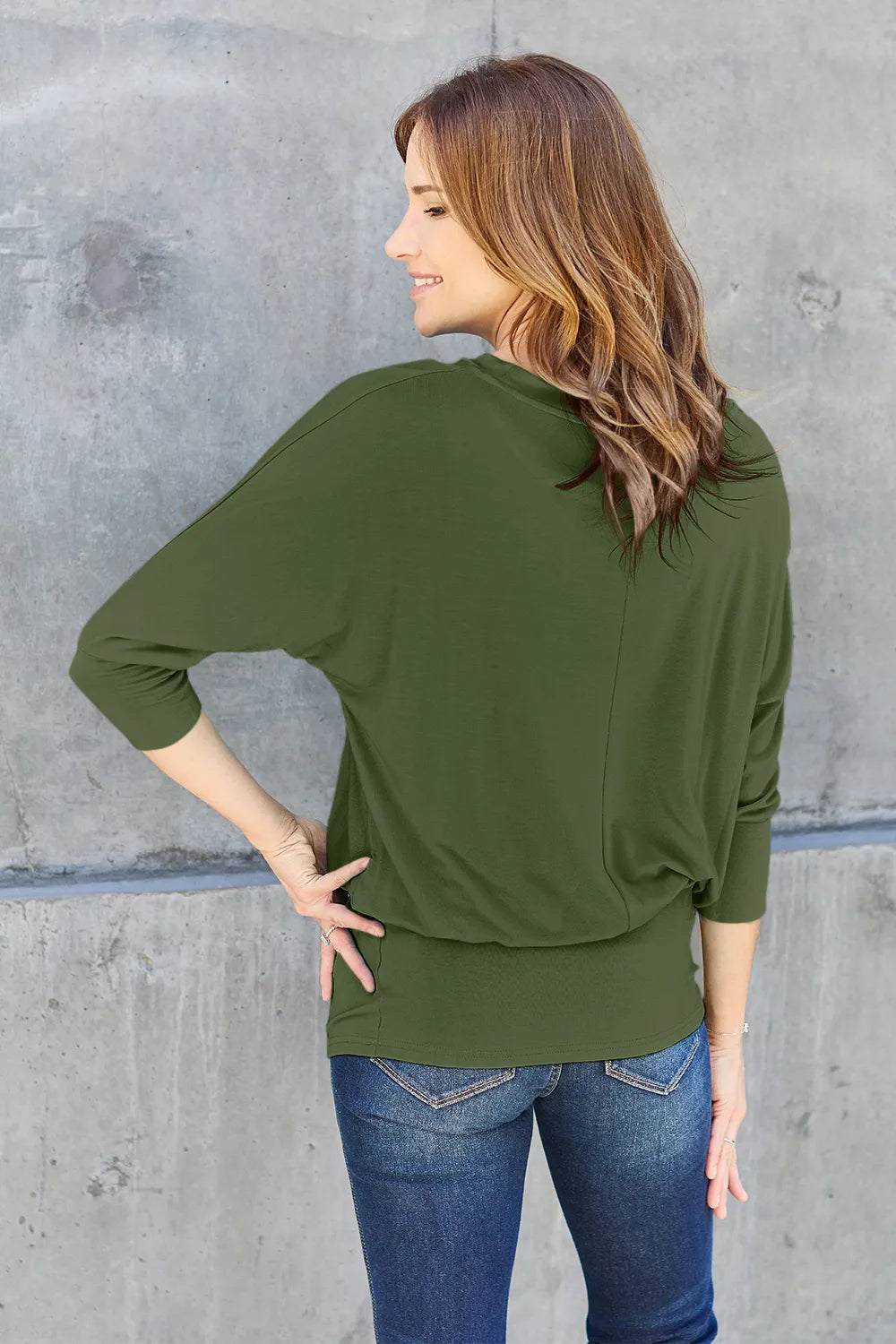 Back detail of Basic Bae full size round neck batwing sleeve top showing soft fabric and draping sleeves
