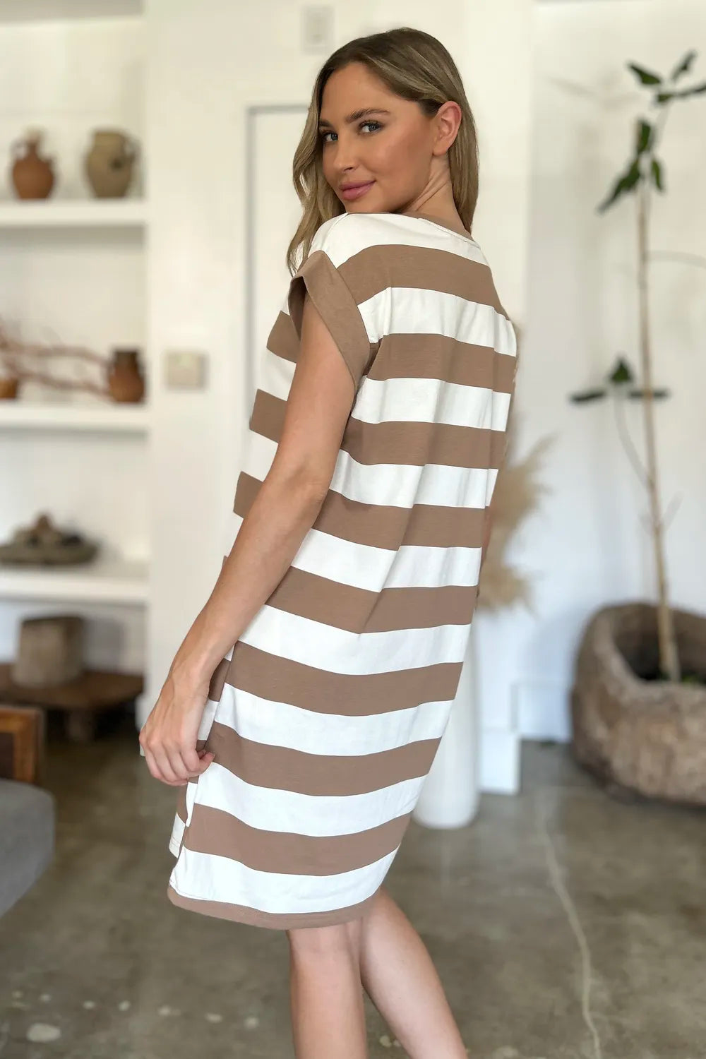 Back view of Basic Bae striped round neck mini dress showing relaxed fit and lightweight summer fabric
