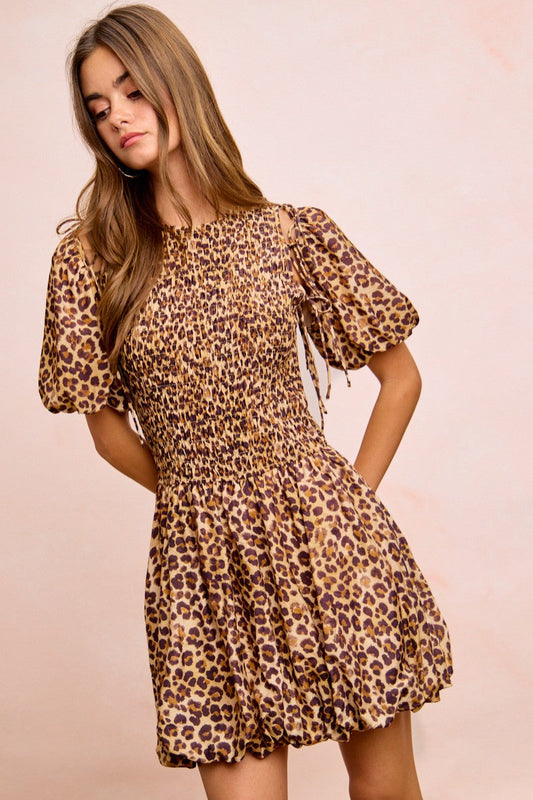 BiBi Leopard Bow Tie Attachable Puff Sleeves Dress front view showing leopard print, bow tie, and puff sleeve details