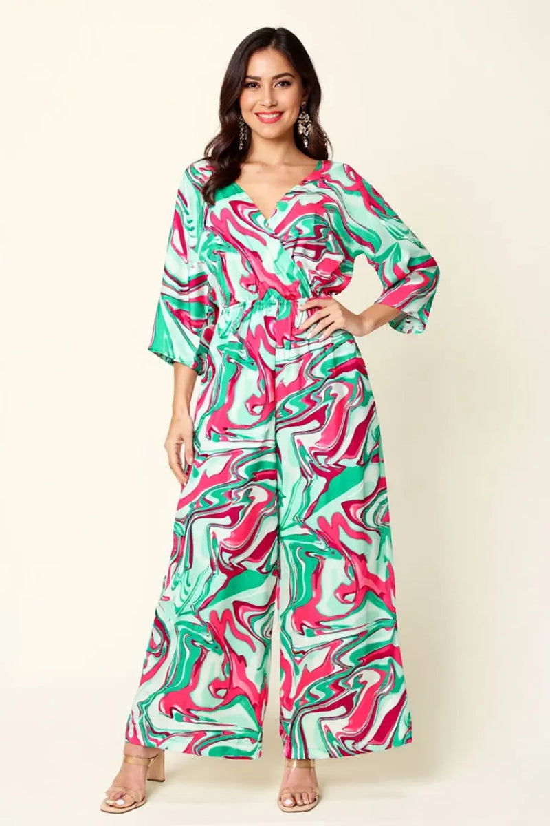 Double Take Full Size Wide Leg Jumpsuit front view - sleeveless full-size jumpsuit with ruched tie waist, deep V-neckline, and flowing wide legs for effortless chic style

