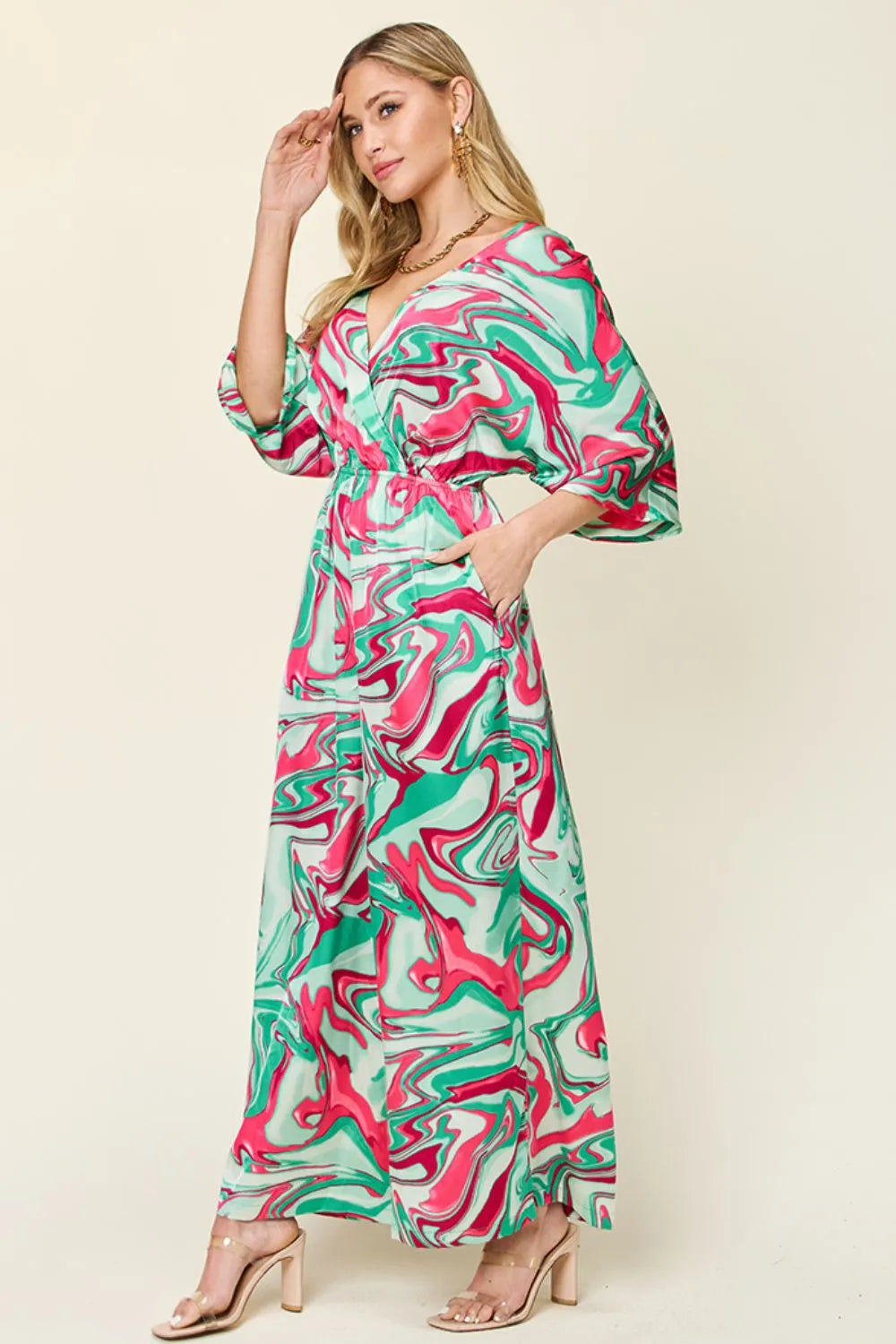Double Take Full Size Wide Leg Jumpsuit side view - relaxed wide leg jumpsuit with side ruching at the waist, soft draped fabric, and full-length silhouette

