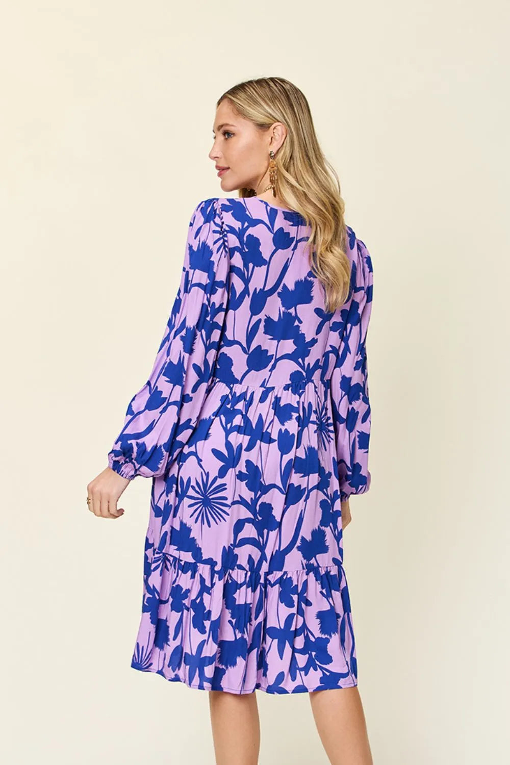 Double Take printed ruffle hem dress back view highlighting flowing fabric and casual style
