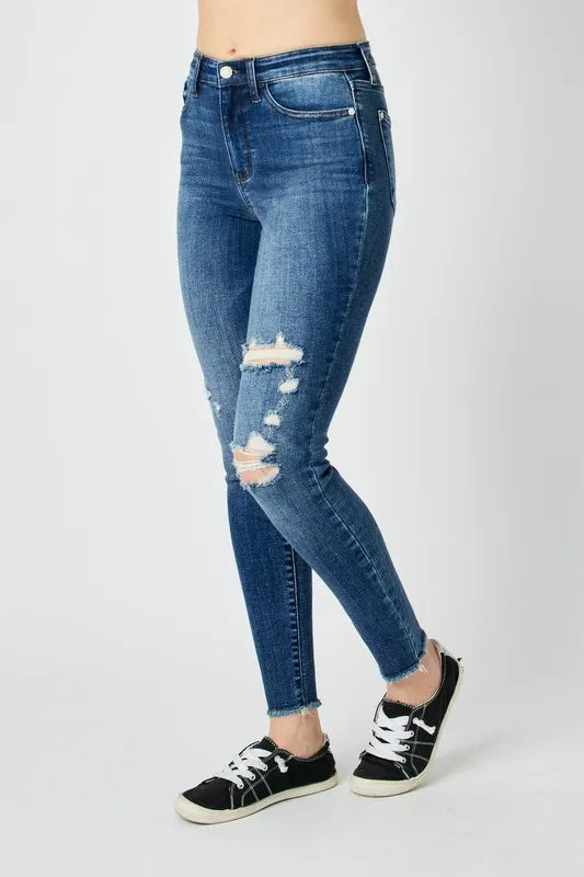 Side view of Judy Blue full size high waist distressed skinny jeans showing slim fit.

