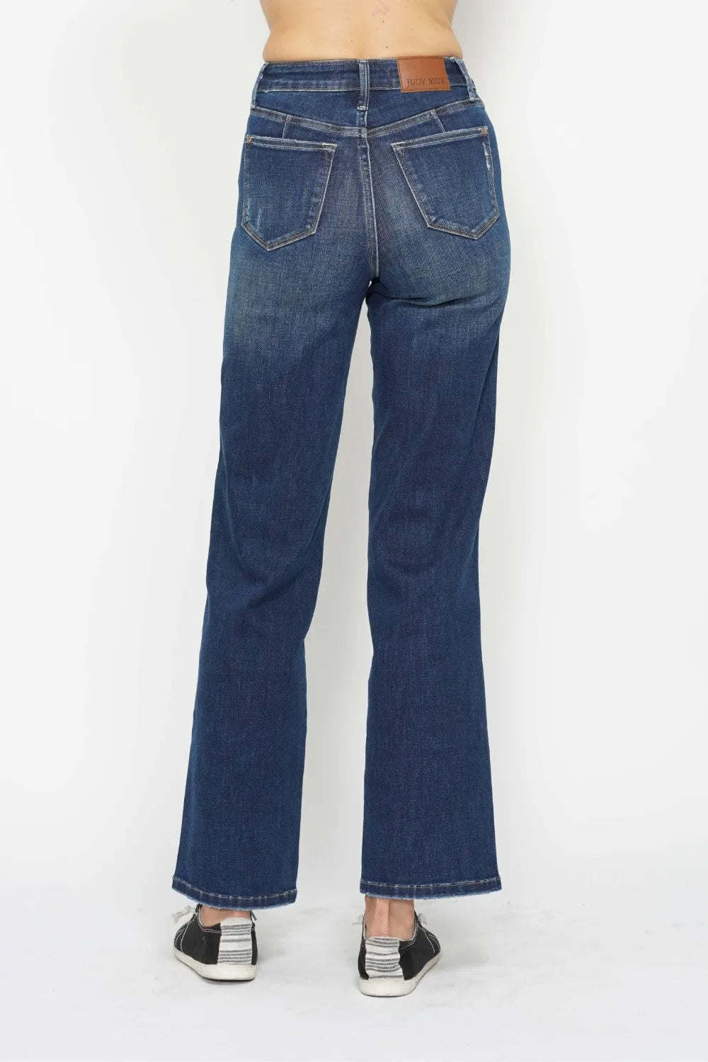 Back view of Judy Blue high waist tummy control jeans. Lifted pocket placement for booty enhancement. Yoke seam detail. No sagging or bagging. Shape retention technology. Full coverage fit.