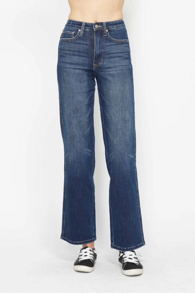 Front view of Judy Blue high waist tummy control jeans. Dark wash denim. Button and zip fly closure. Five pocket styling. Smoothing high rise waistband. 