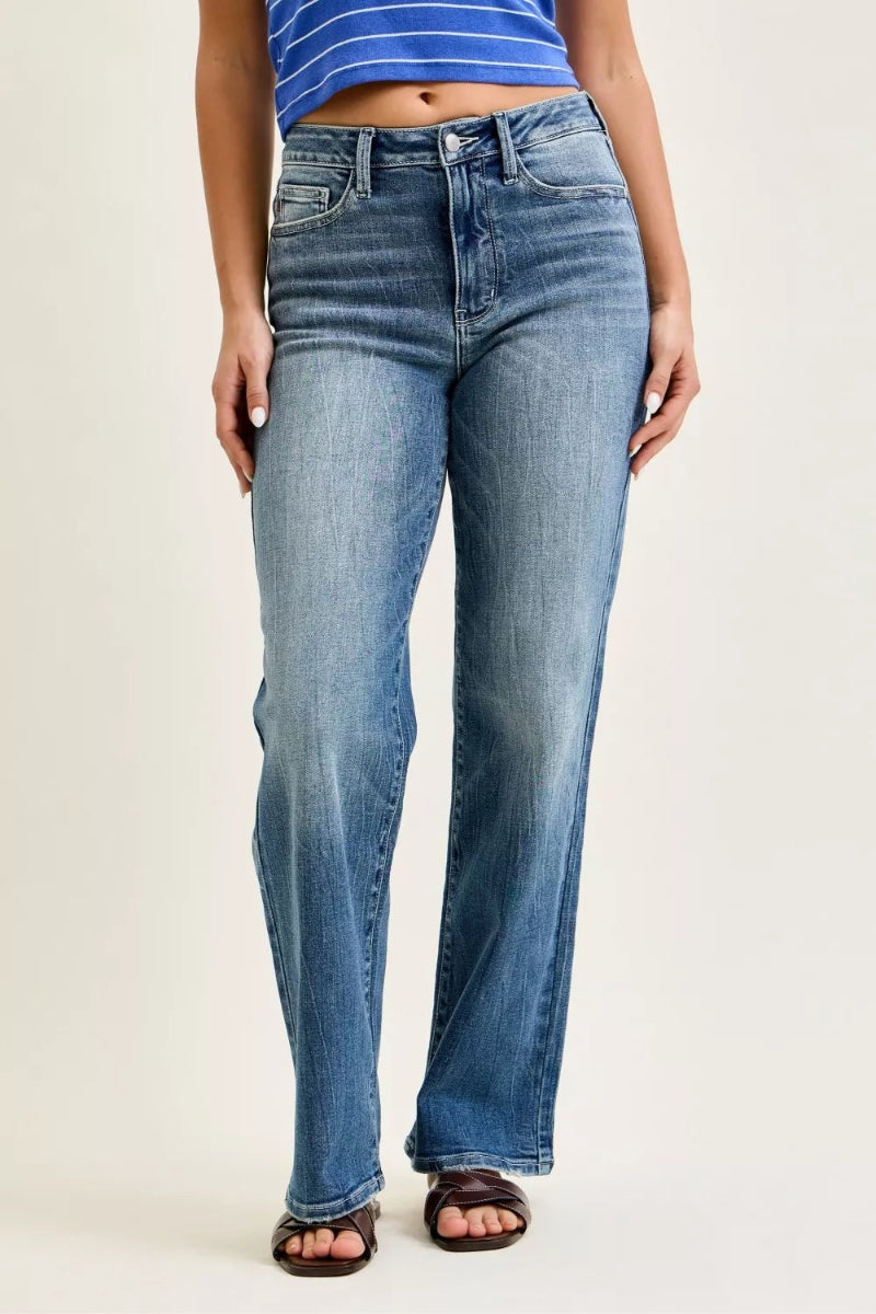 Judy Blue mid rise 90s straight leg jeans for women model standing facing front, showing mid-rise waist, straight leg fit, classic denim wash, full-length view