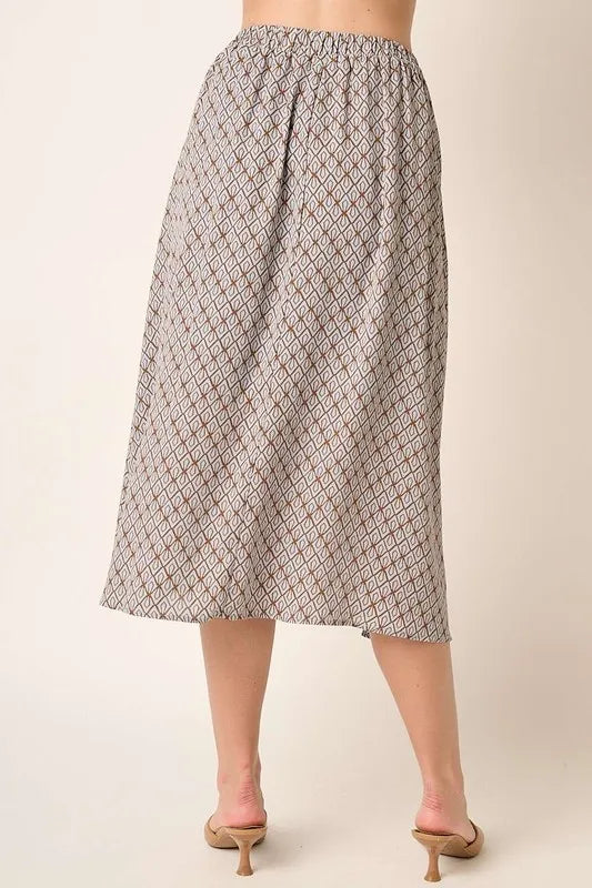 Back view of Mittoshop printed midi skirt showing smooth finish and flattering drape
