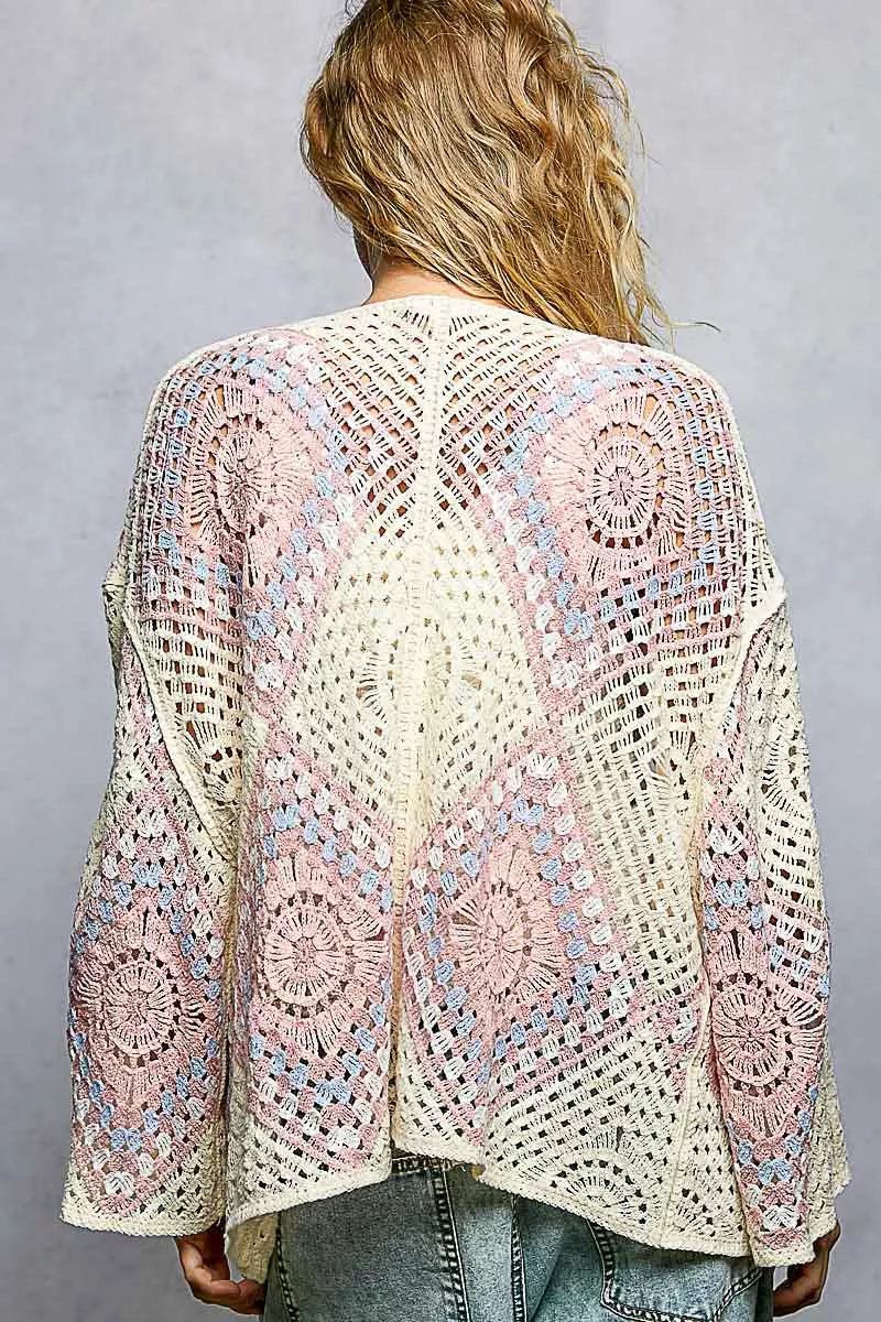 Back view of the POL open front crochet cardigan, displaying the full multicolor granny square pattern across the back.

