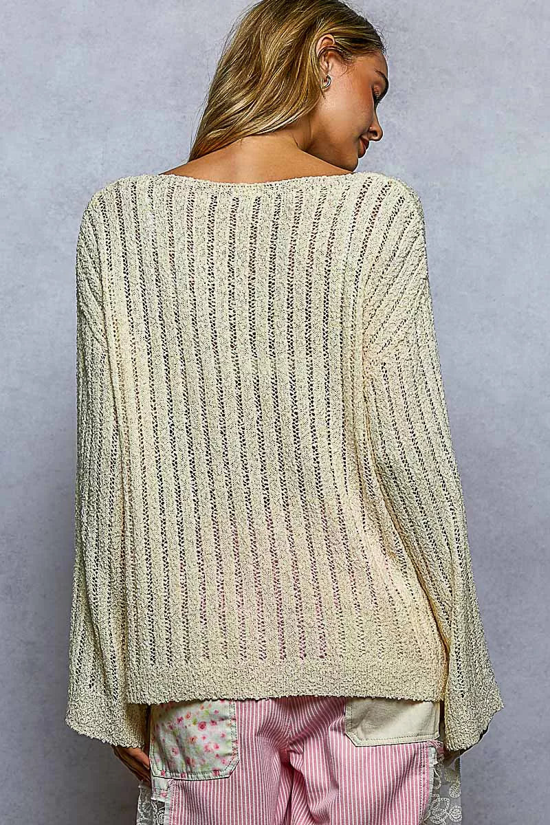 Back view of POL open weave knit sweater. Consistent knit pattern across back. Relaxed fit through shoulders and torso. Long sleeves with ribbed or straight cuffs. Lightweight breathable fabric.