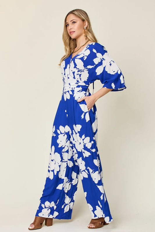 side view of printed wide leg jumpsuit showing flowy wide leg movement and flattering silhouette for all body types