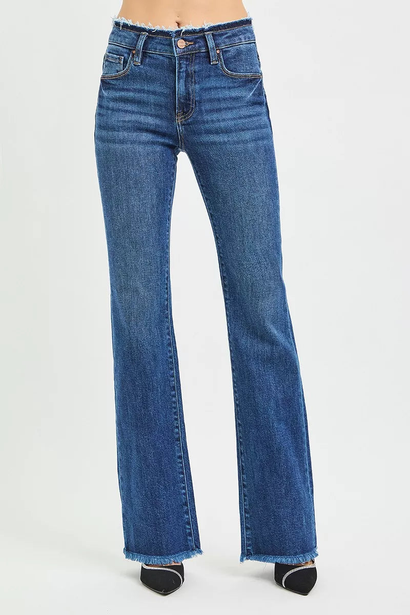RISEN mid rise bootcut jeans front view, model facing front, frayed waistband detail, raw hem at bottom, bootcut leg opening, denim casual fit