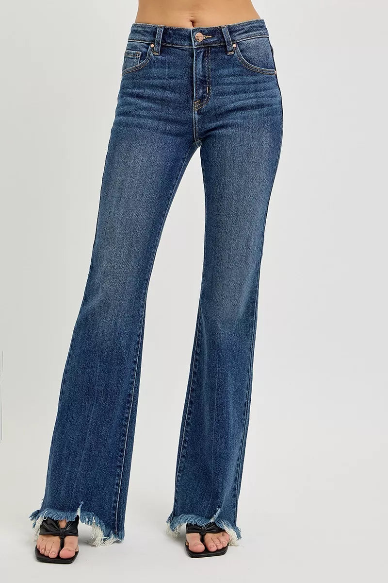 Front view of RISEN full size mid rise flare frayed hem jeans, showing the medium wash, flare leg, and frayed hem in plus size.
