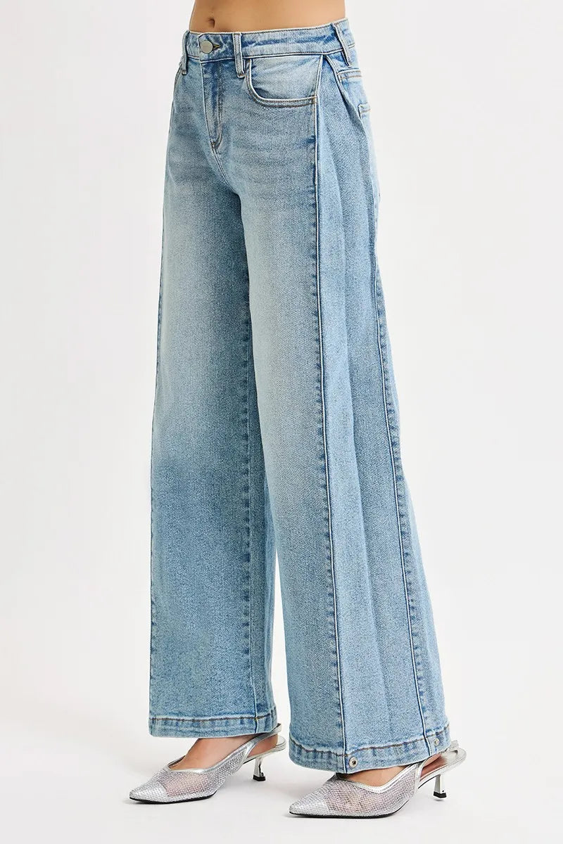 Side view of RISEN Mid Rise Wide Barrel Transferable Leg Snap Jeans showing relaxed shape and transferable snap leg design
