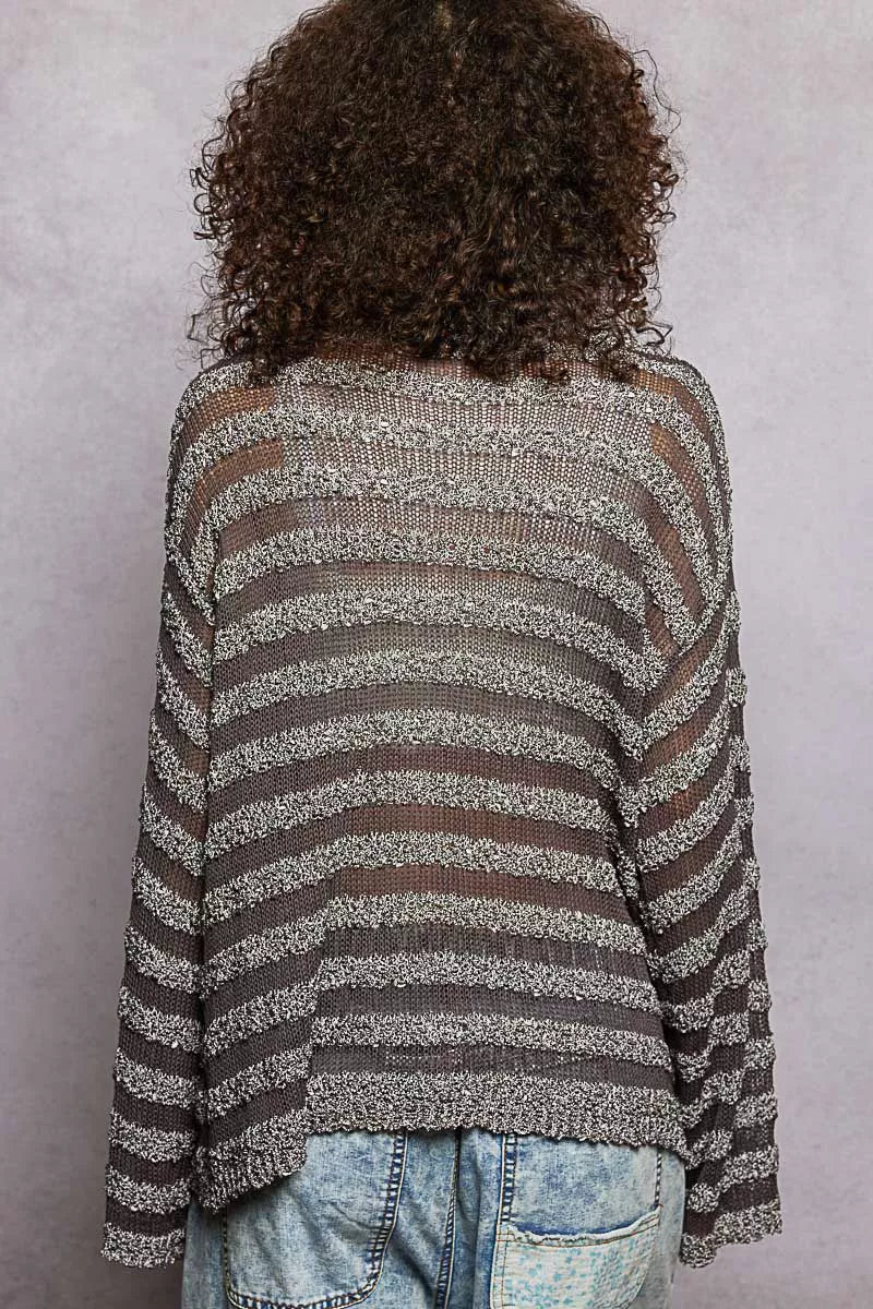 Back view of stripe pattern V-neck long sleeve knit top showing overall knit design
