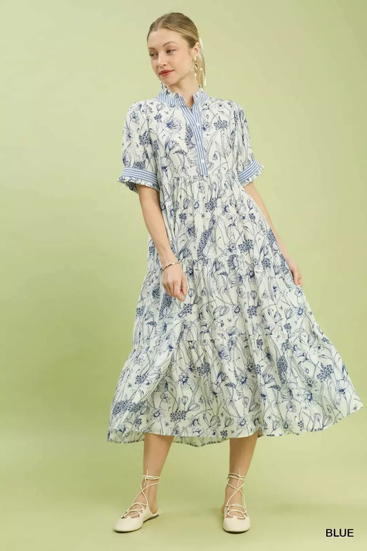 Front view of Umgee floral tiered midi dress with ruffle trim showing flowy lightweight fabric and feminine summer style
