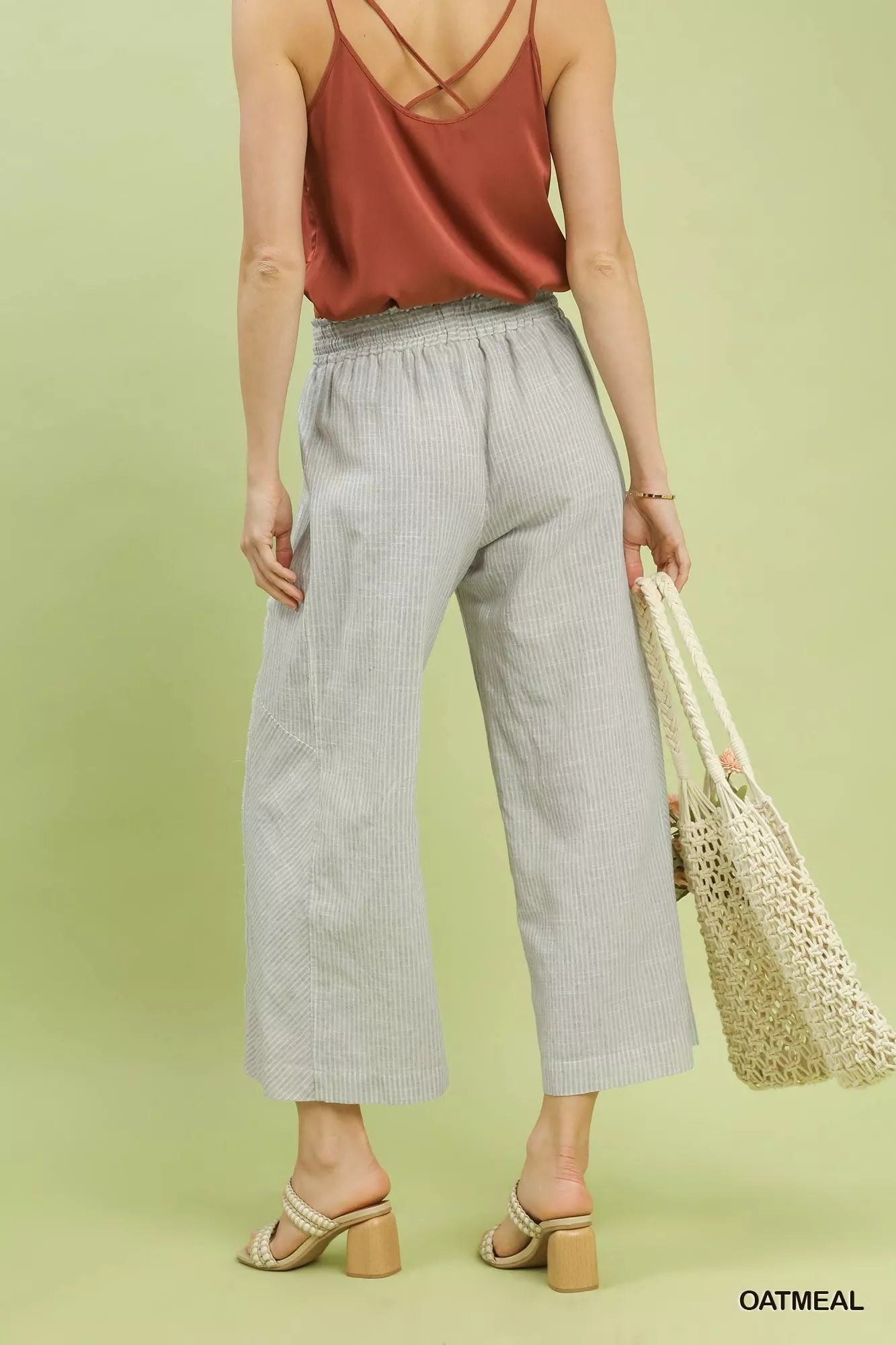 Back view of Umgee linen blend striped wide leg pants showing stripe pattern and drape.
