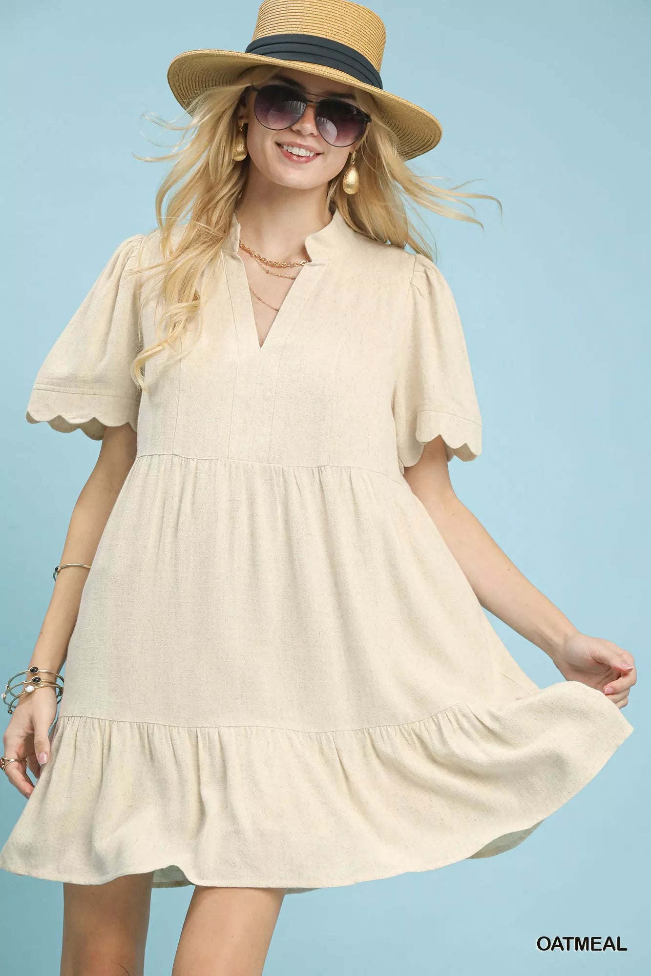 Front view of Umgee linen tiered babydoll dress with scalloped sleeves showing relaxed fit
