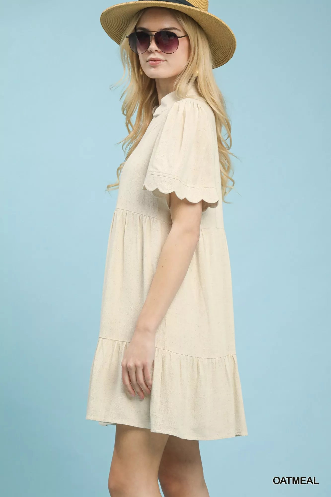 Side view of Umgee linen tiered babydoll dress with scalloped sleeves showing airy silhouette
