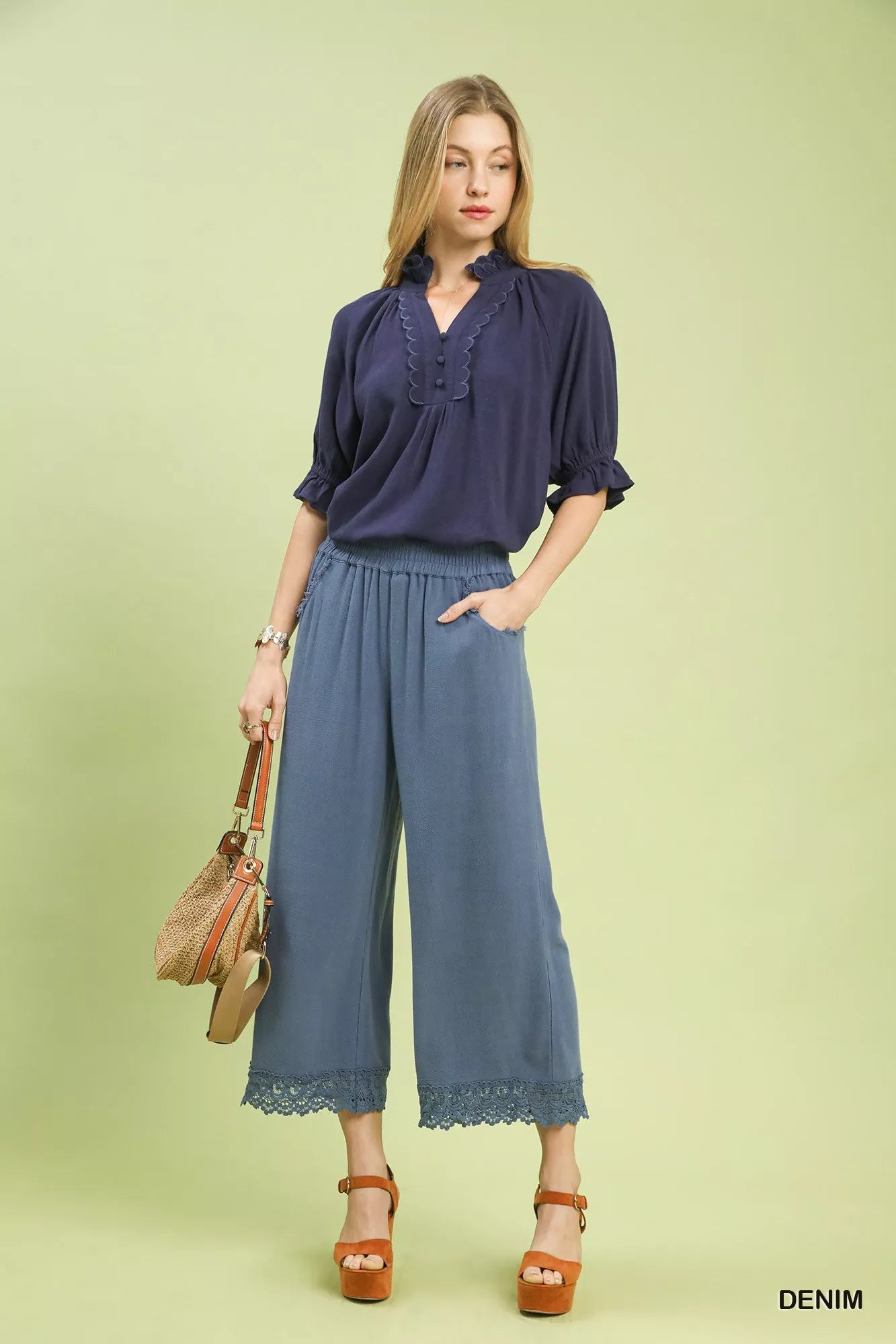 Front angle of Umgee linen wide leg cropped pants showing lace trim detail
