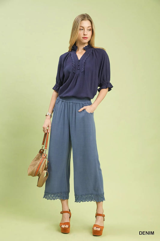 Front angle of Umgee linen wide leg cropped pants showing lace trim detail
