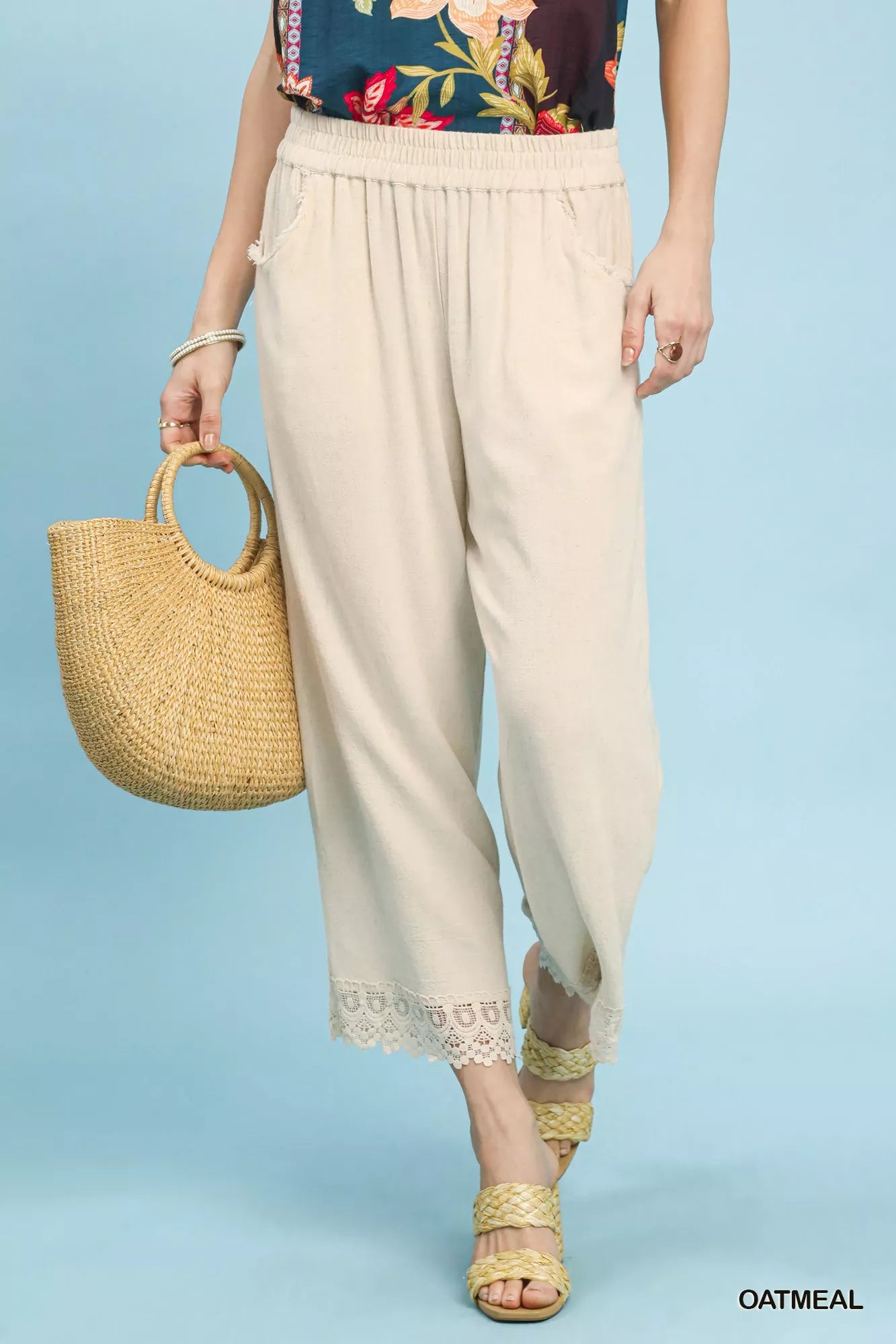 Front view of Umgee linen wide leg cropped pants with lace trim showing relaxed fit and breathable linen fabric
