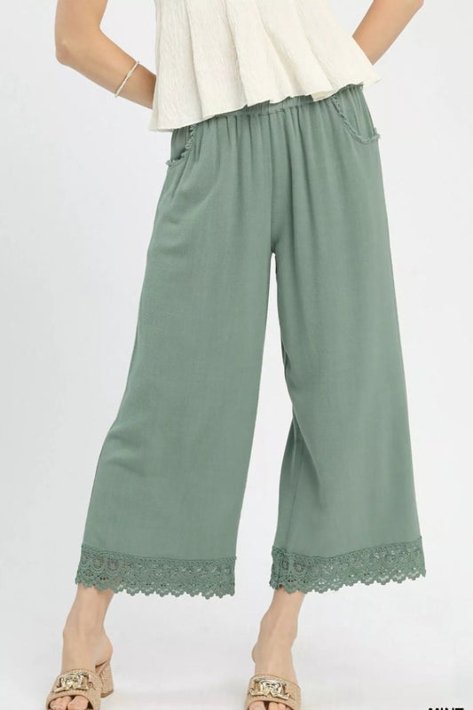 Front view of Umgee Linen Wide Leg Cropped Pants with Lace Trim, styled for casual summer outfits for US women