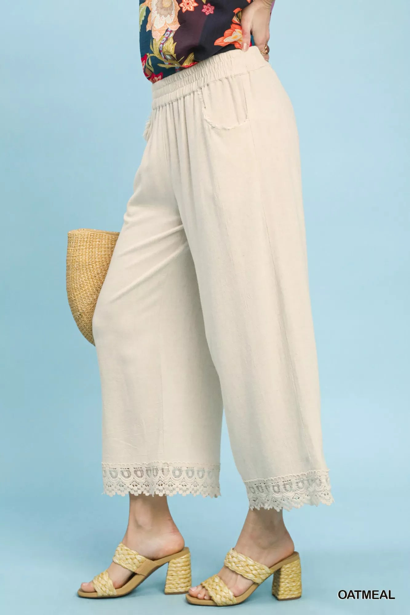 Side view of Umgee linen wide leg cropped pants with lace trim showing cropped length and flowy wide leg silhouette
