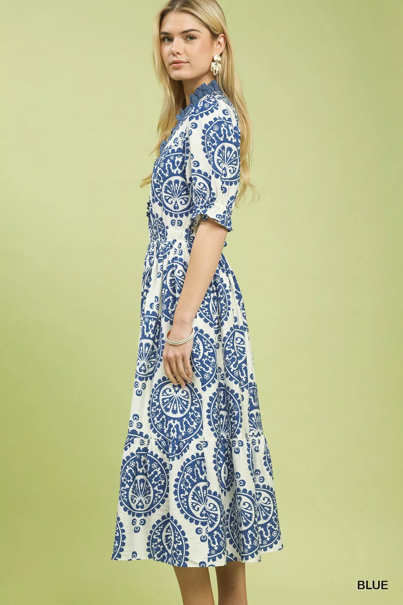 Side view of Umgee paisley midi dress highlighting smocked waist and lightweight, comfortable fabric
