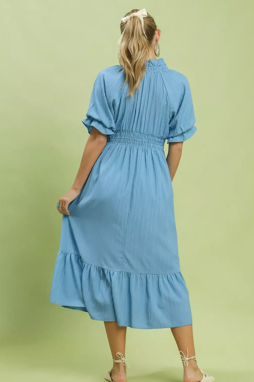 Umgee ruffle V-neck midi dress for women model standing facing back, back view of ruffle V-neck midi dress, showing ruffle accents and midi length from behind