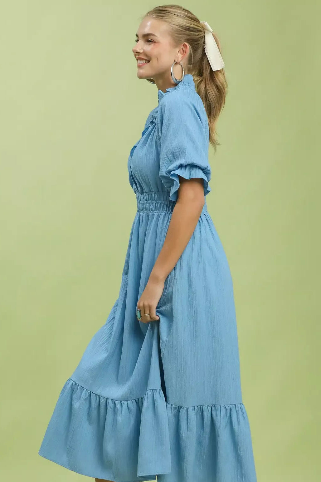 Umgee ruffle V-neck midi dress for women model standing facing side, side view of ruffle midi dress, showing V-neckline and draped fit