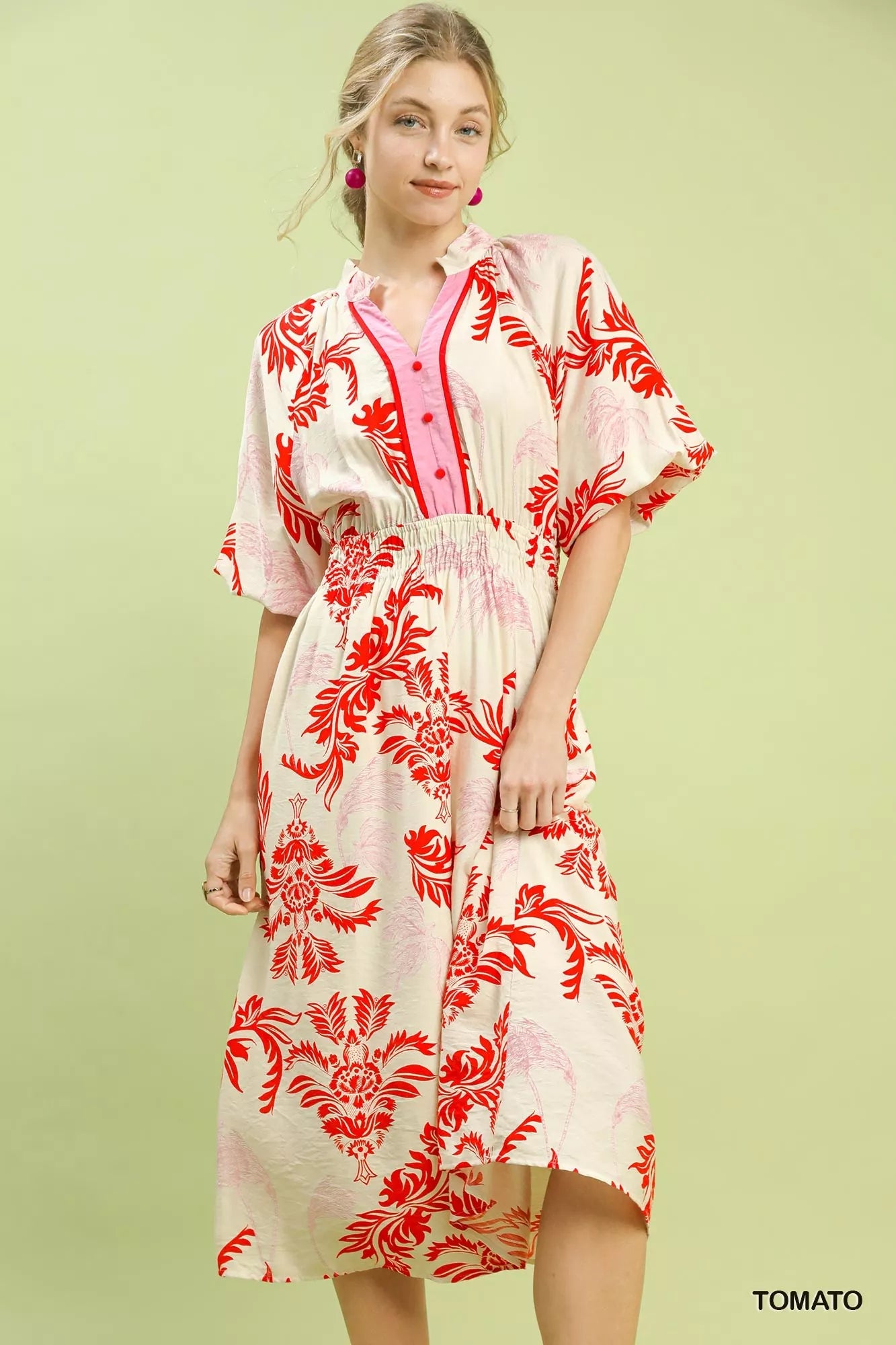 Front detail of Umgee tropical print midi dress highlighting buttons and lightweight fabric

