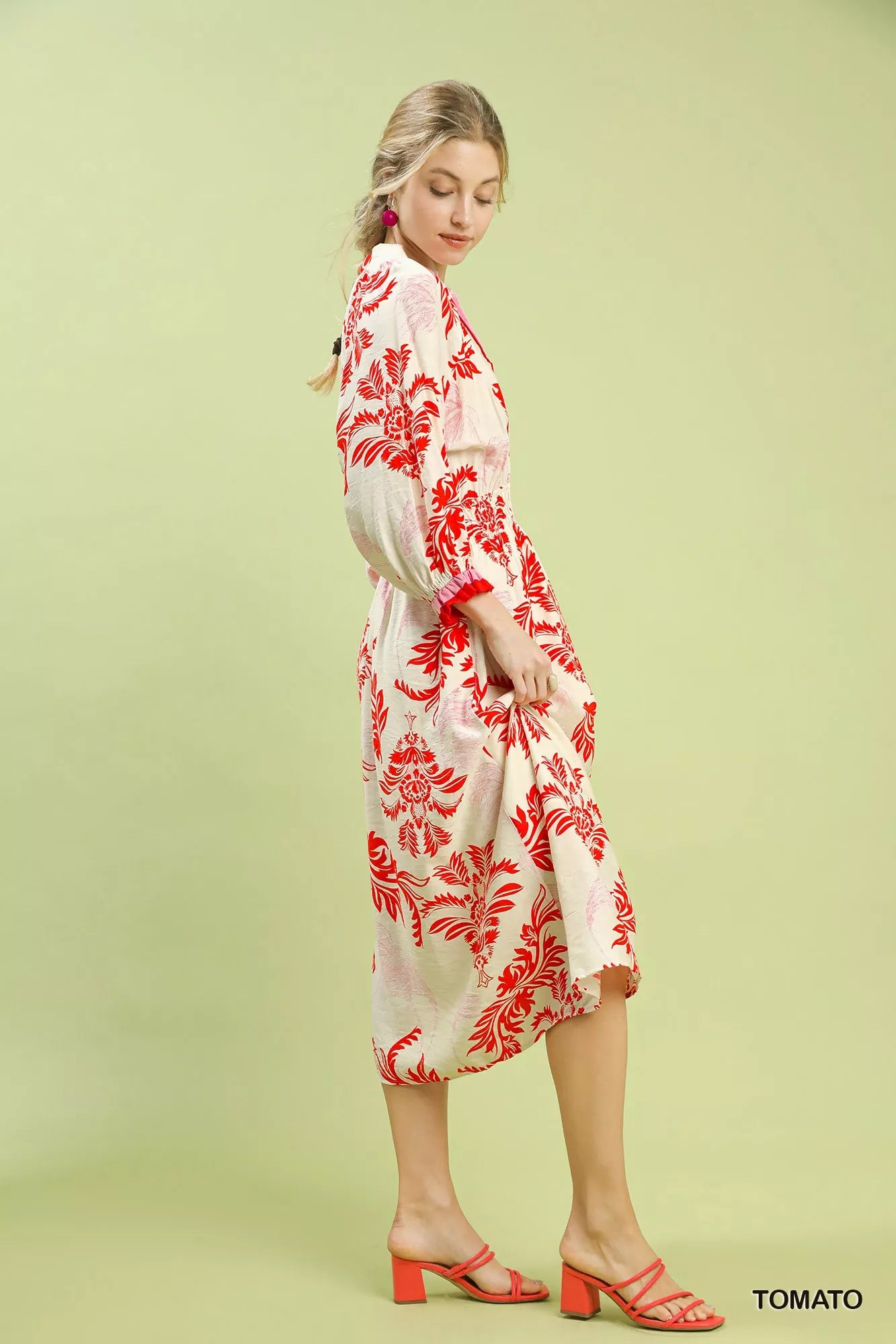 Side view of Umgee tropical print midi dress showing flowy fit, button details, and flattering midi length
